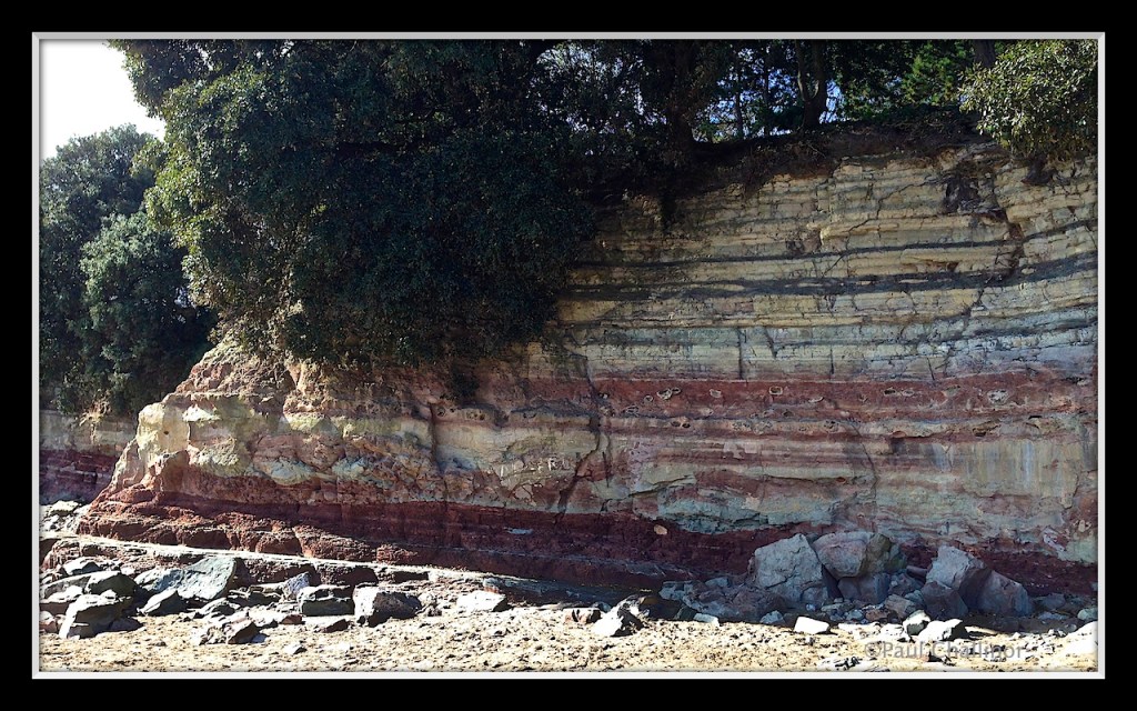 Sedimetary cliffs at the edge of Barry Island beach.