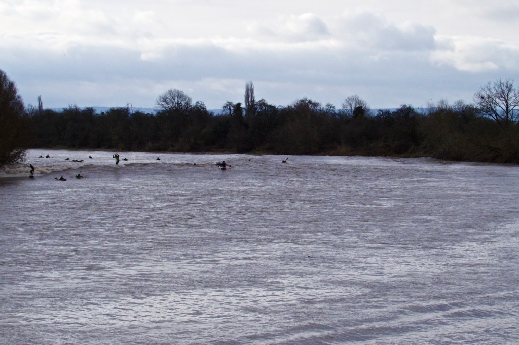 The Severn Bore approaching around the bend in the river