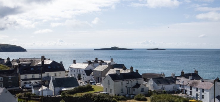 Looking back onto Aberdaron, with Ynys Gwylan Fach and Ynys Gwylan Fawr just off shore.