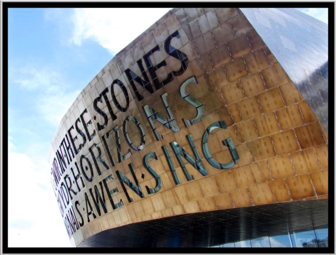 Inscribed on the front of the dome, above the main entrance, are two poetic lines, written by Welsh poet Gwyneth Lewis. The Welsh version is Creu Gwir fel gwydr o ffwrnais awen, which means "Creating truth like glass from the furnace of inspiration." The English is In These Stones Horizons Sing. 
