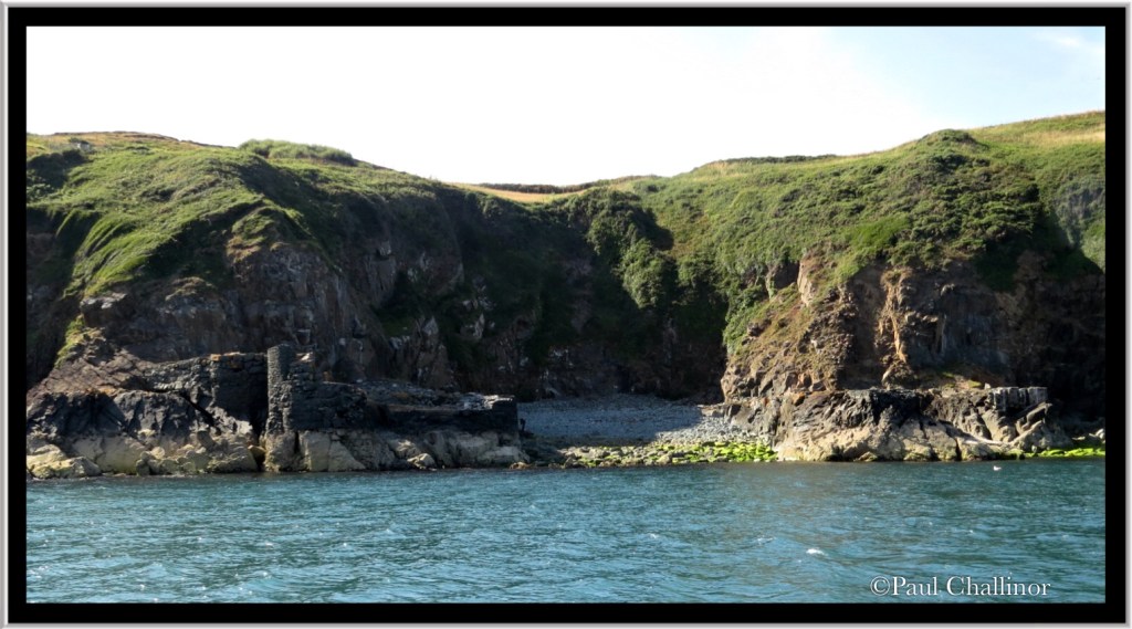 Porth y Pistyll from water level.