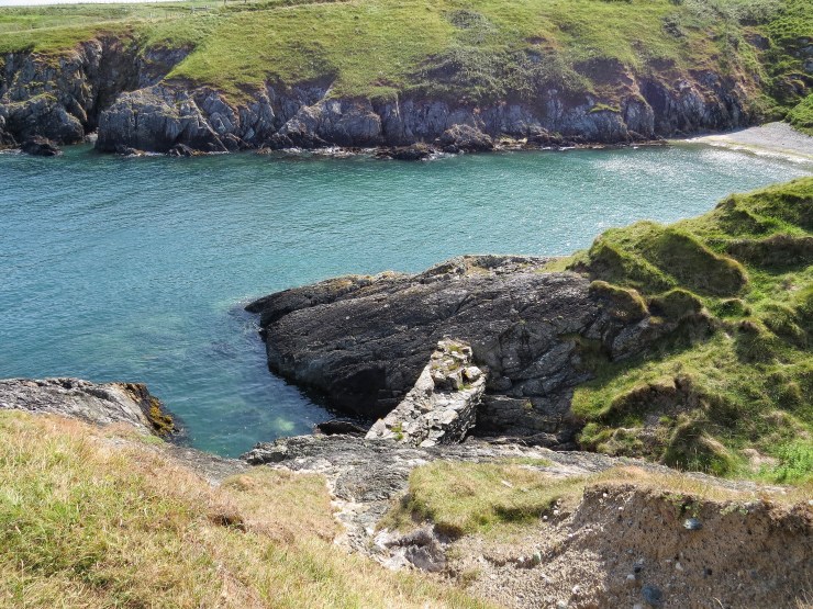 Looking down on the small jetty at Porth Ferin.