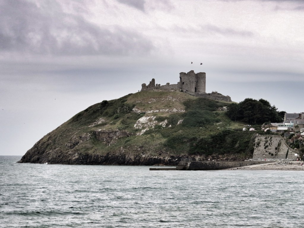 There used to be a row of cottages underneath the castle, but these were destroyed in a storm.