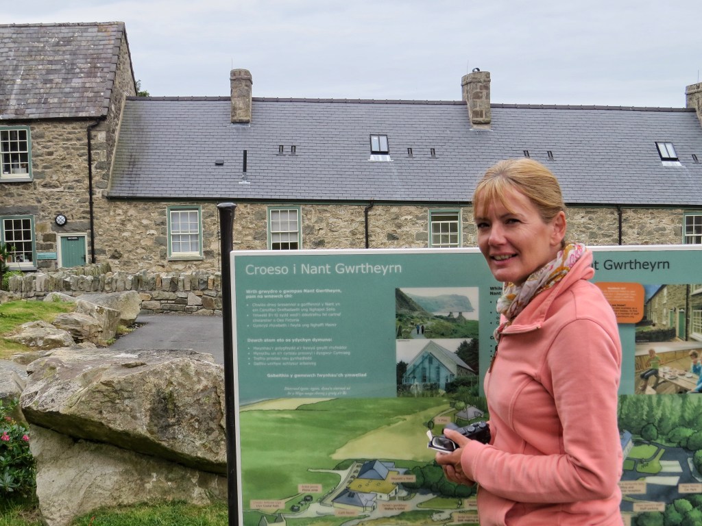 Aunty starting to learn Welsh by reading the welcome sign. I've already taught how to swear in Welsh.