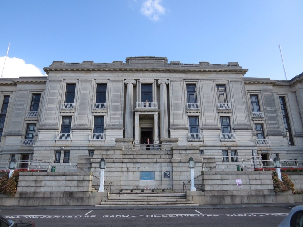 The front facade to the library, Aunty eager to get in and 