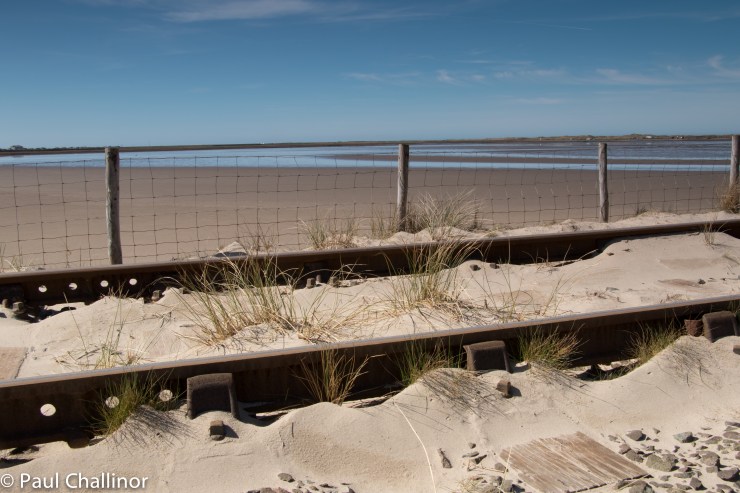 The prevailing south westerly winds blow sand on the lines, and almost make the track part of the dune systems.