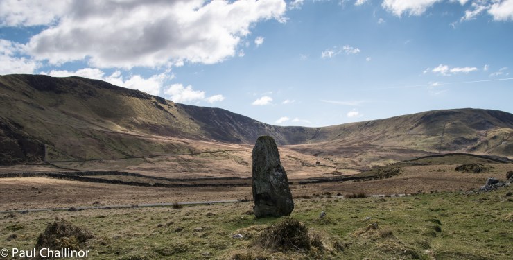 One of the the larger standing stones near the lake with the ridge of Craig-y-Llyn behind, there are a number of cairns along this ridge