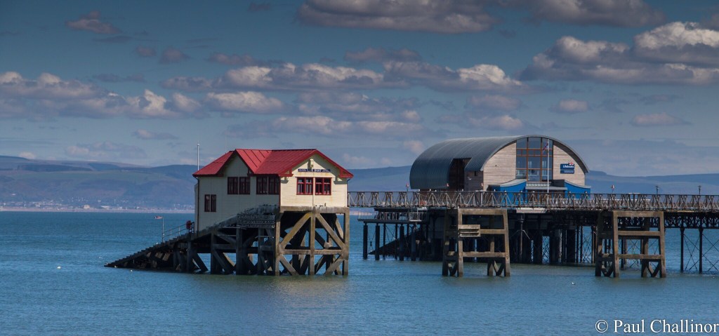 The old life boat station on the left is no longer large enough for the new life boats, and are now launched from the new station on the right.
