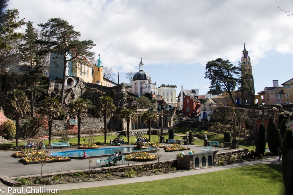 The centre of the village has a small garden square, and the buildings surround this central area.