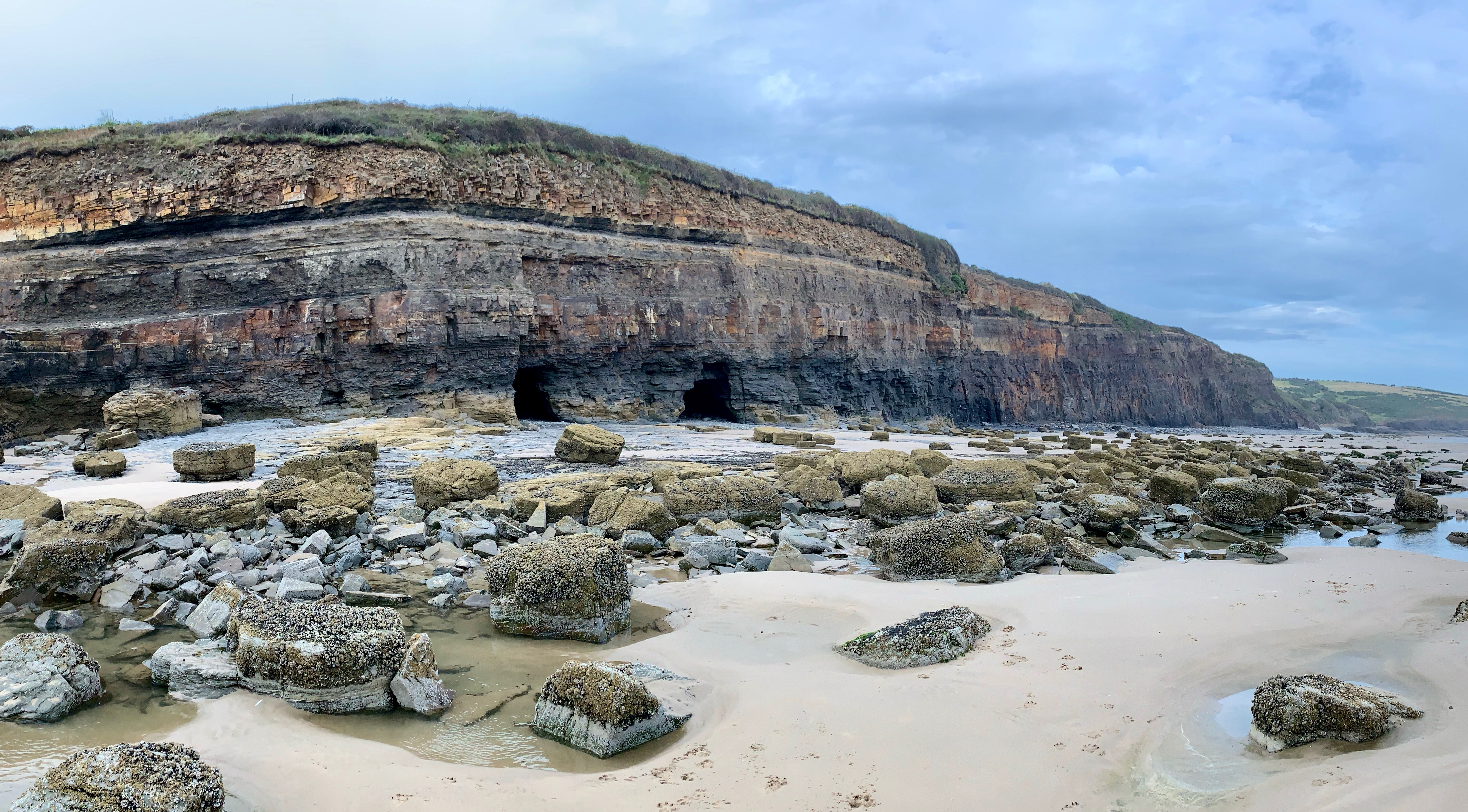 The cliffs at the east end of Amroth beach. Lines in geological history.