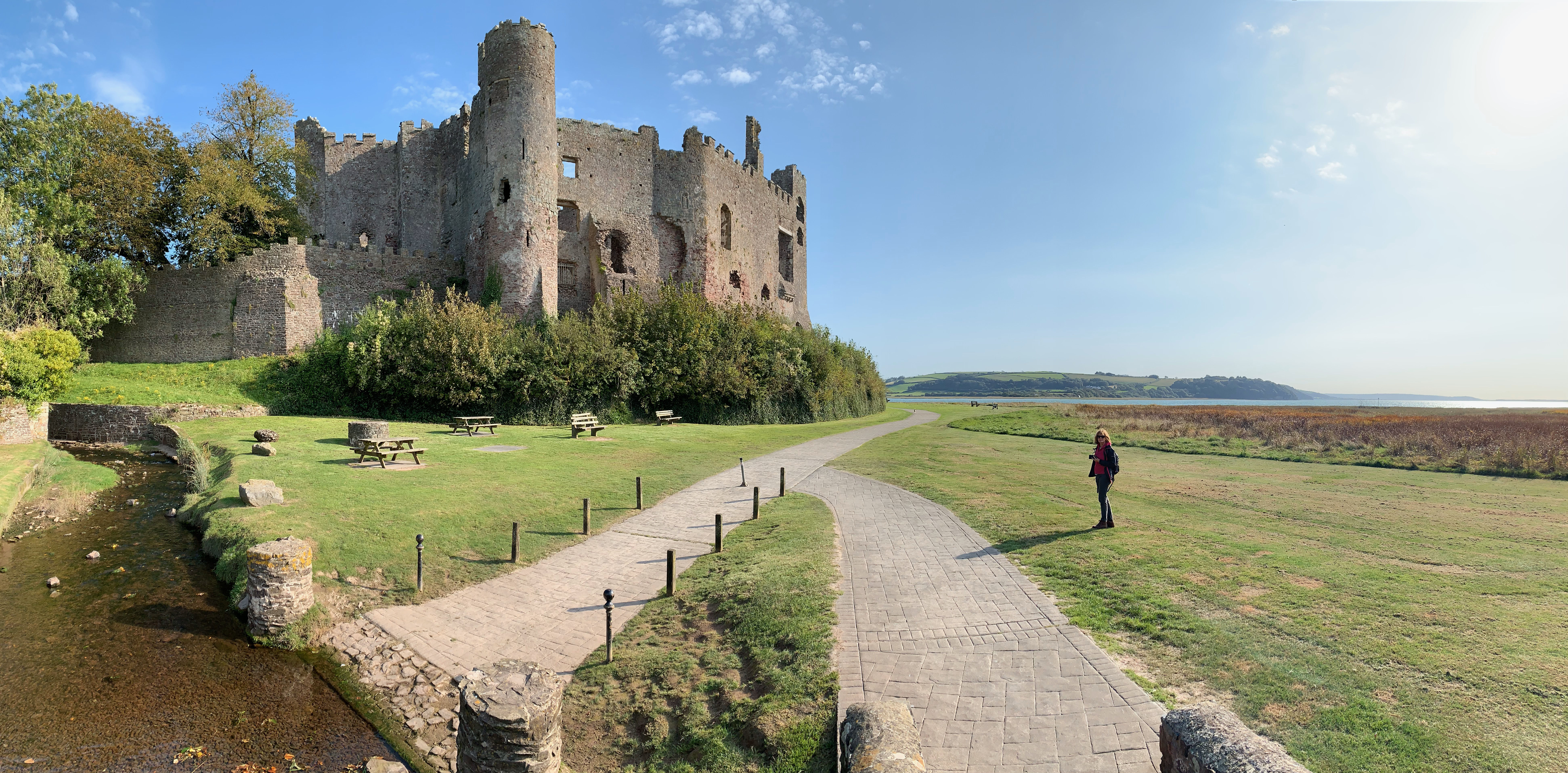 Laugharne Castle sitting right on the edge of the estuary.