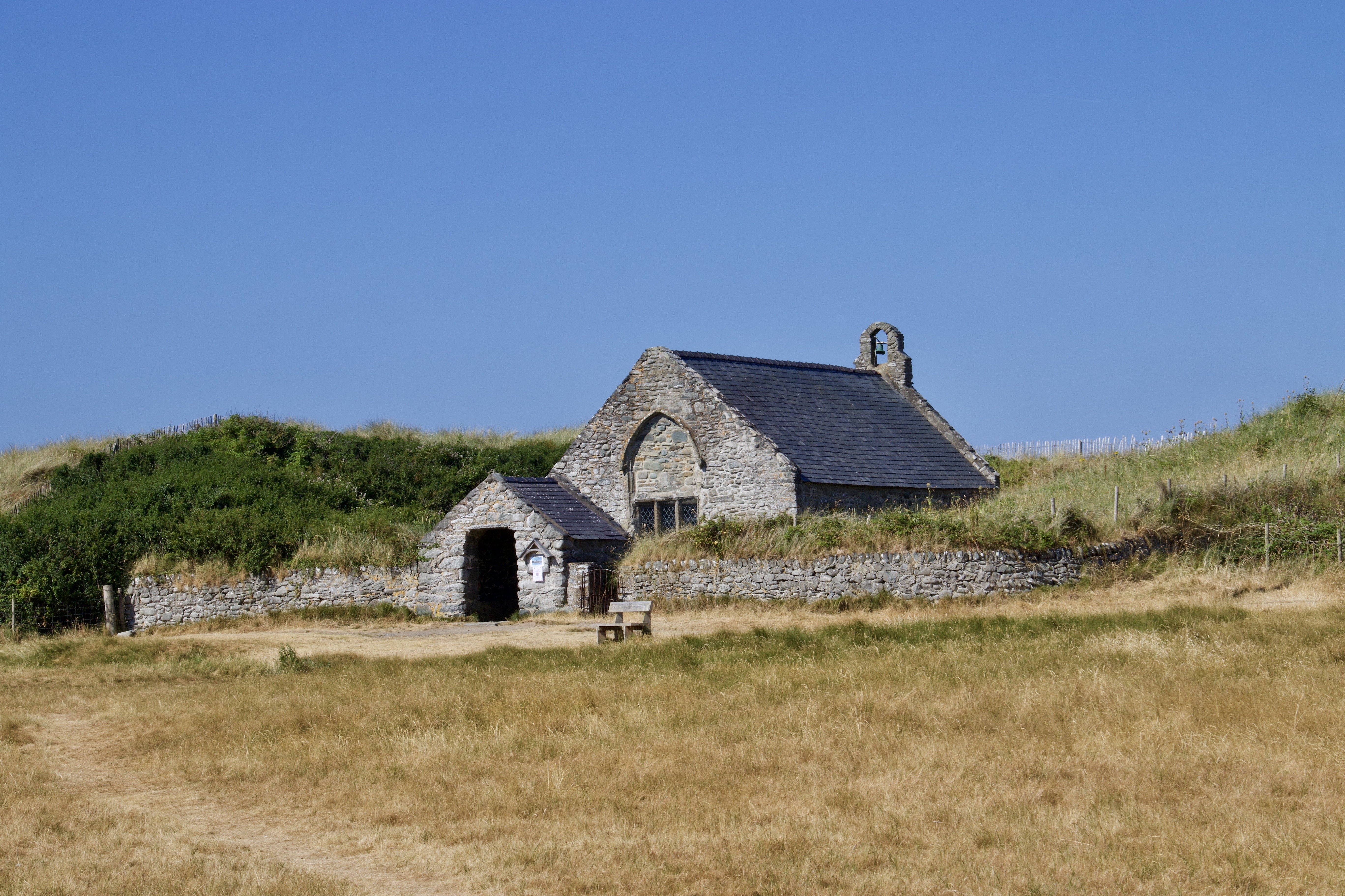 Llandanwg, an ancient church struggling against sand dunes. 