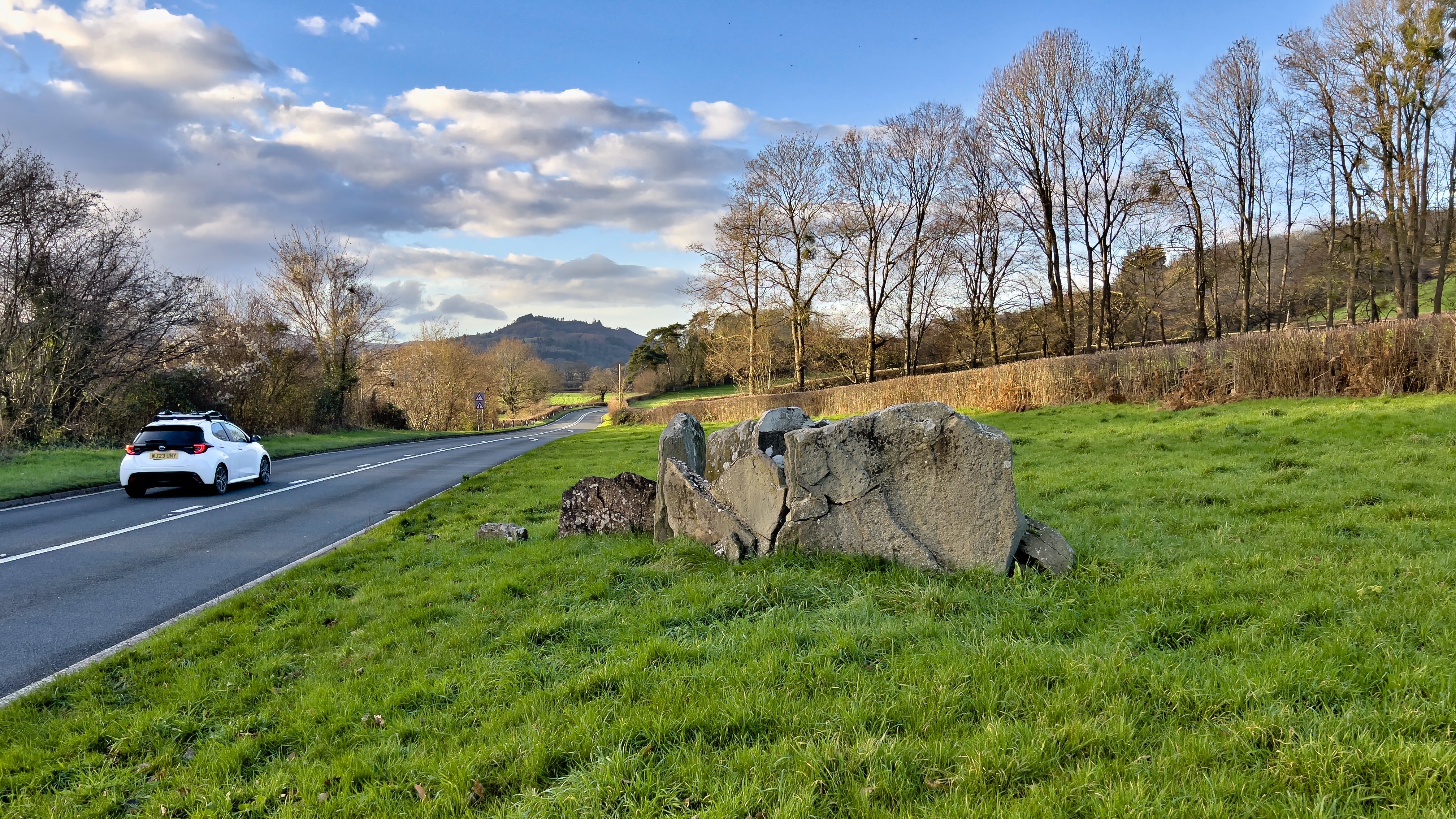 This view looking west shows how close the busy road is.