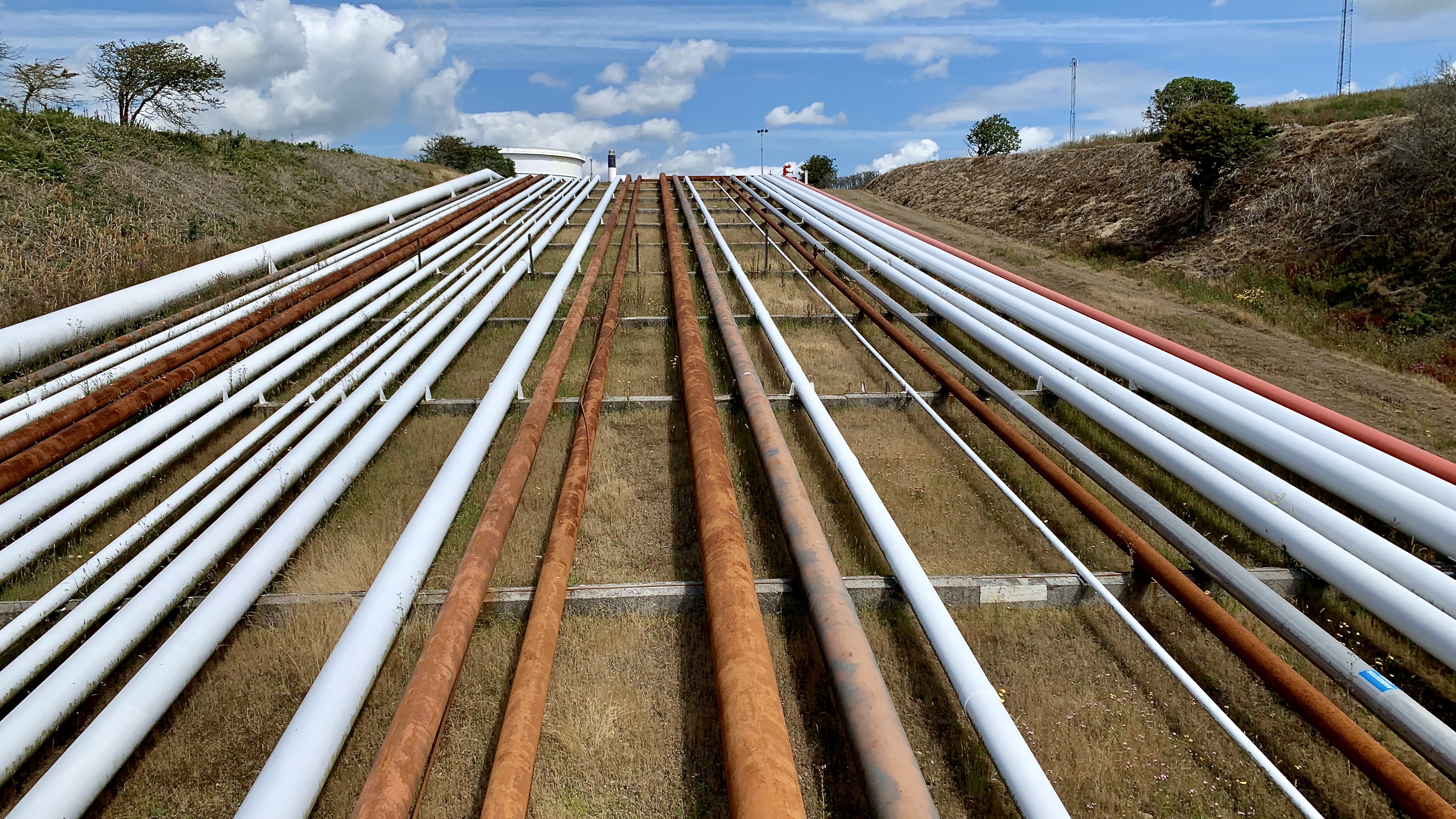 Pipes leading up from the harbour to the refineries onshore.
