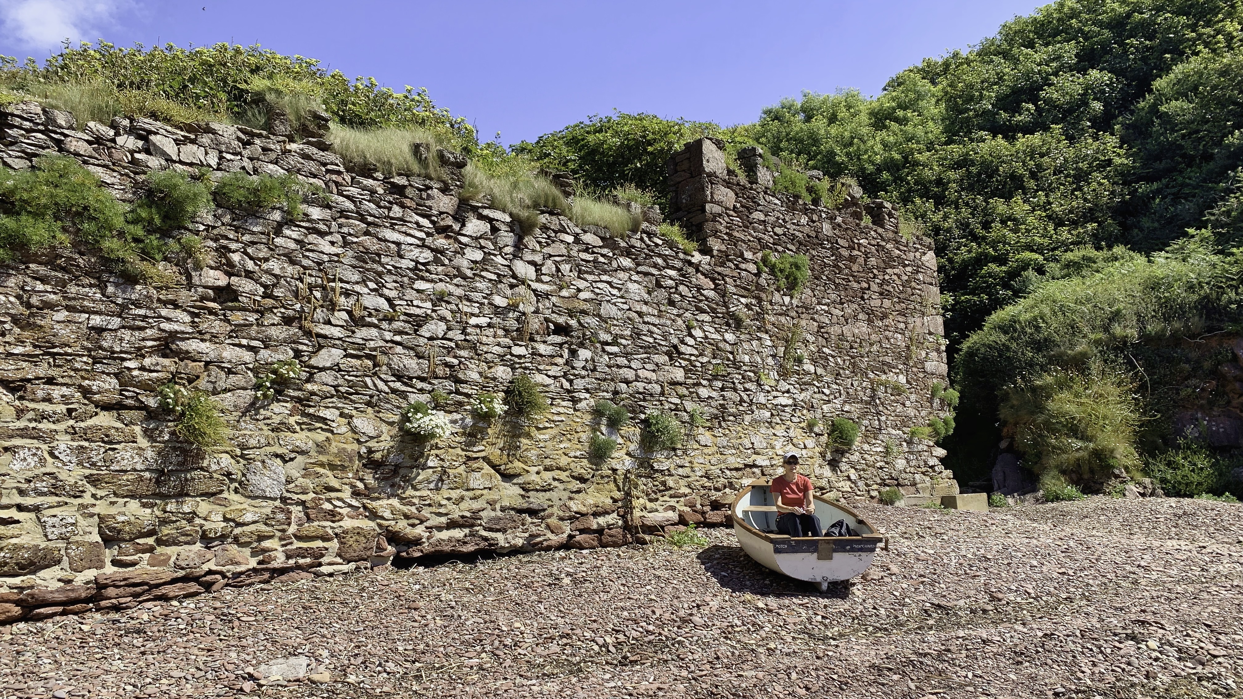 The wall across Monk Haven. If there’s a boat on the beach, why not sit in it?